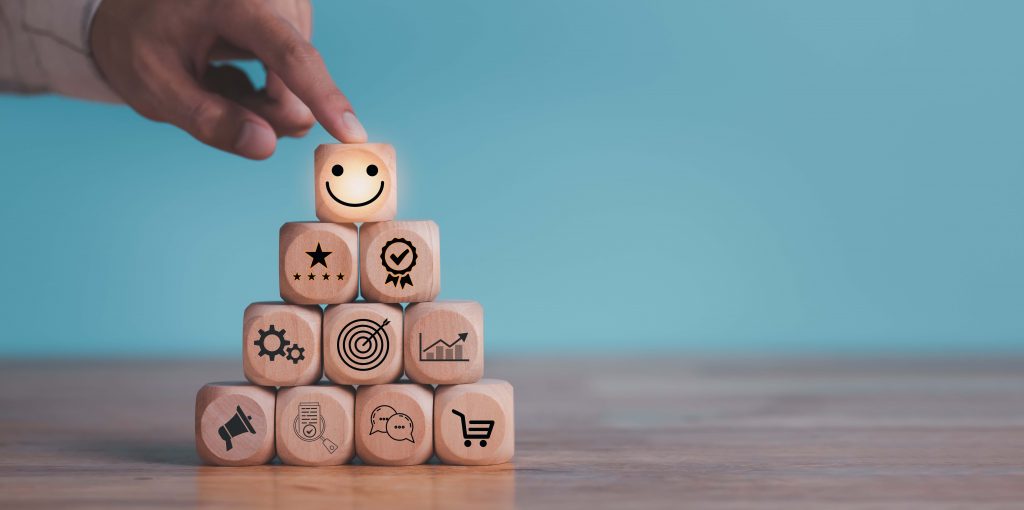 Consumer showing satisfaction rating concept with wooden blocks ,evaluation business success ,Services and Products and Customer Engagement ,Online ratings and reviews ,Quality Assessment
