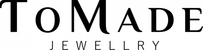 business logo of Tomade
