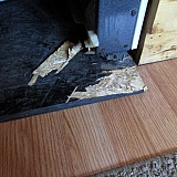 This is the way they left the riser under the oven after they said they did a "deep clean"!