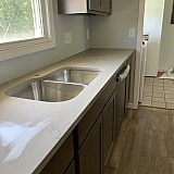Not sure how the after pics became sideways. There is also a glare. These countertops are a leathered texture. I love it.