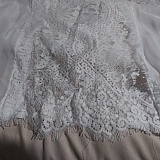 Notice the thread on the right? It's not tacked down and is like that from the top all the way to the bottom just on that side.