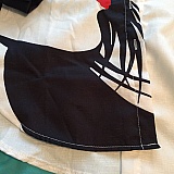 White stitching. Compare this to the picture shown online... you won't see this stitching. Fabric isn't what I thought would be but acceptable