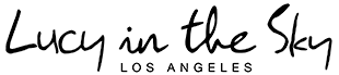 business logo of Lucy in the Sky
